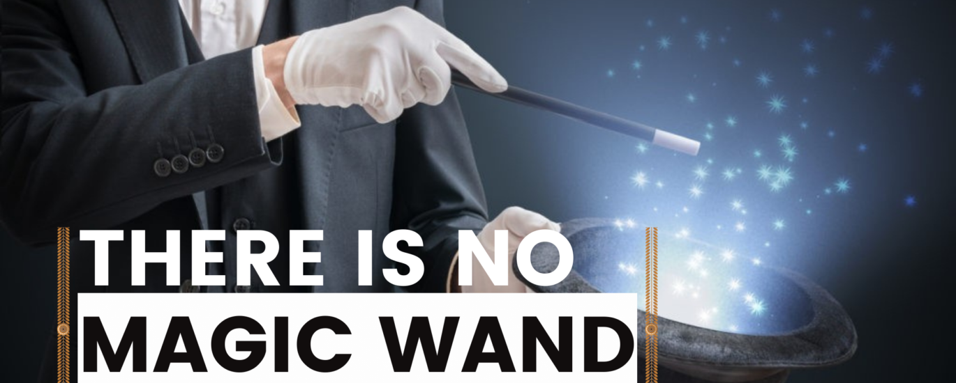 There is no magic wand, a magician with a magic wand showing a trick